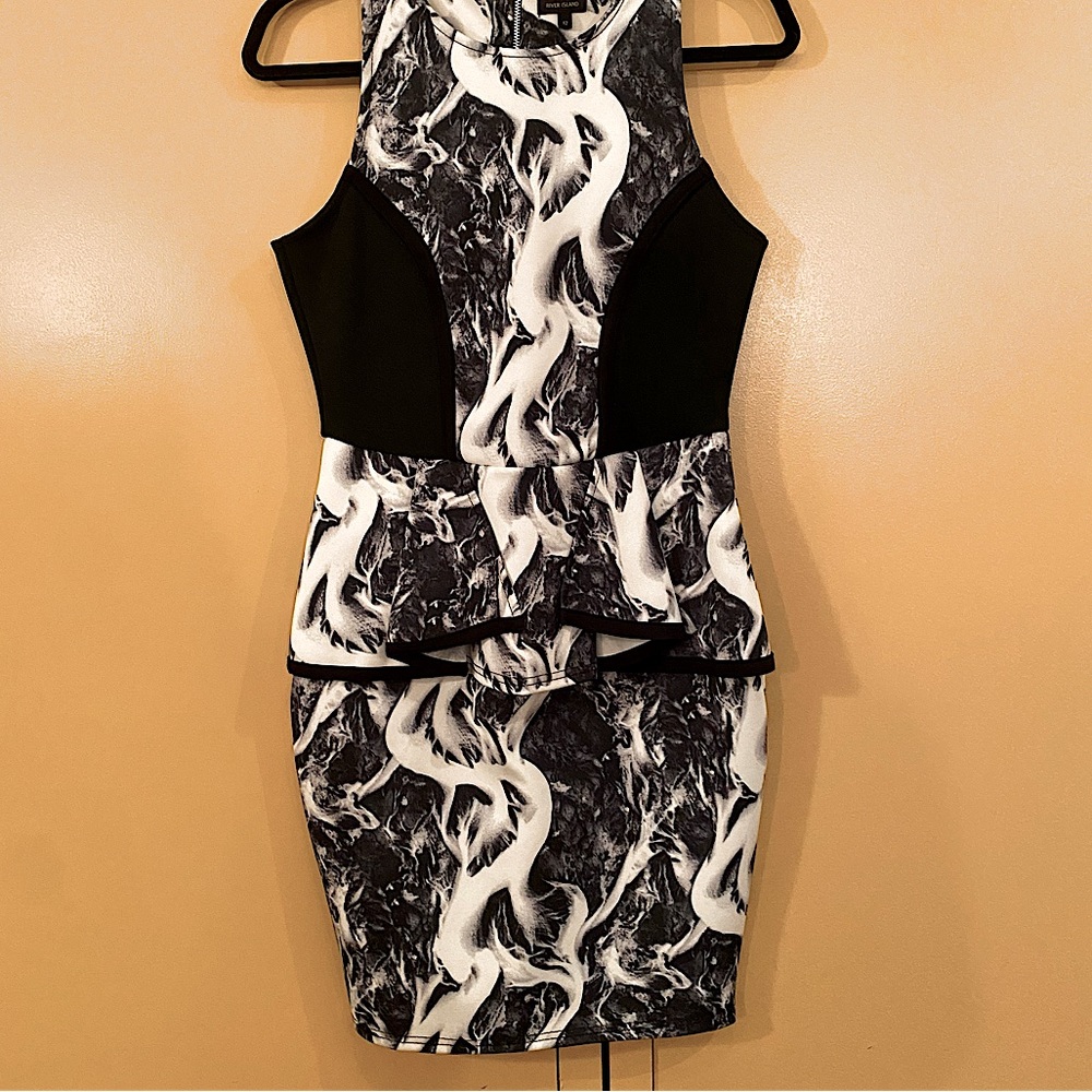 River Island scuba mini dress with peplum in black and white print. Size 8 US.